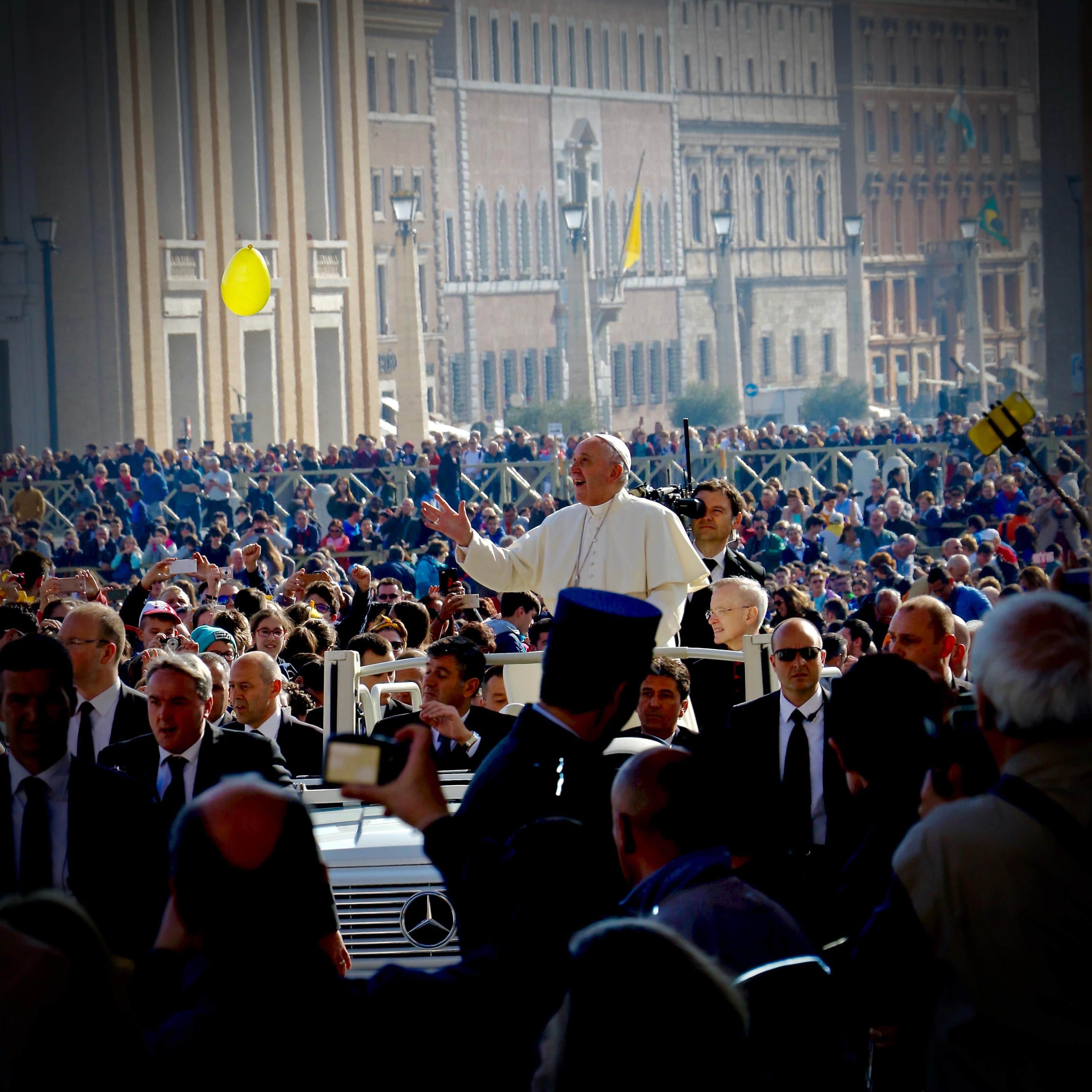Pope Francis with a yellow balloon at the Papal Audience at the Vatican